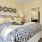 a bedroom with a bed and lamps