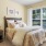 a bedroom with a large window