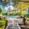 a pool surrounded by trees and bushes