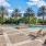 a pool with chairs around it