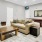a living room with a couch and a table