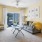a living room with a bed and couches