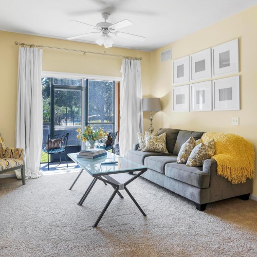 Wide open living areas perfect for entertaining a living room with a bed and couches
