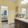 a bathroom with a tub sink and toilet