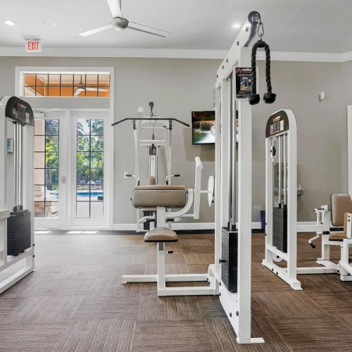 Get your workout on spacious fitness center with lots of windows