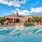a swimming pool in front of a house